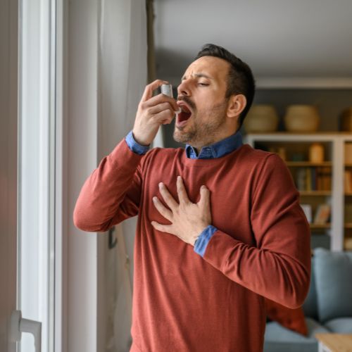 Inhaler being used by asthma patient